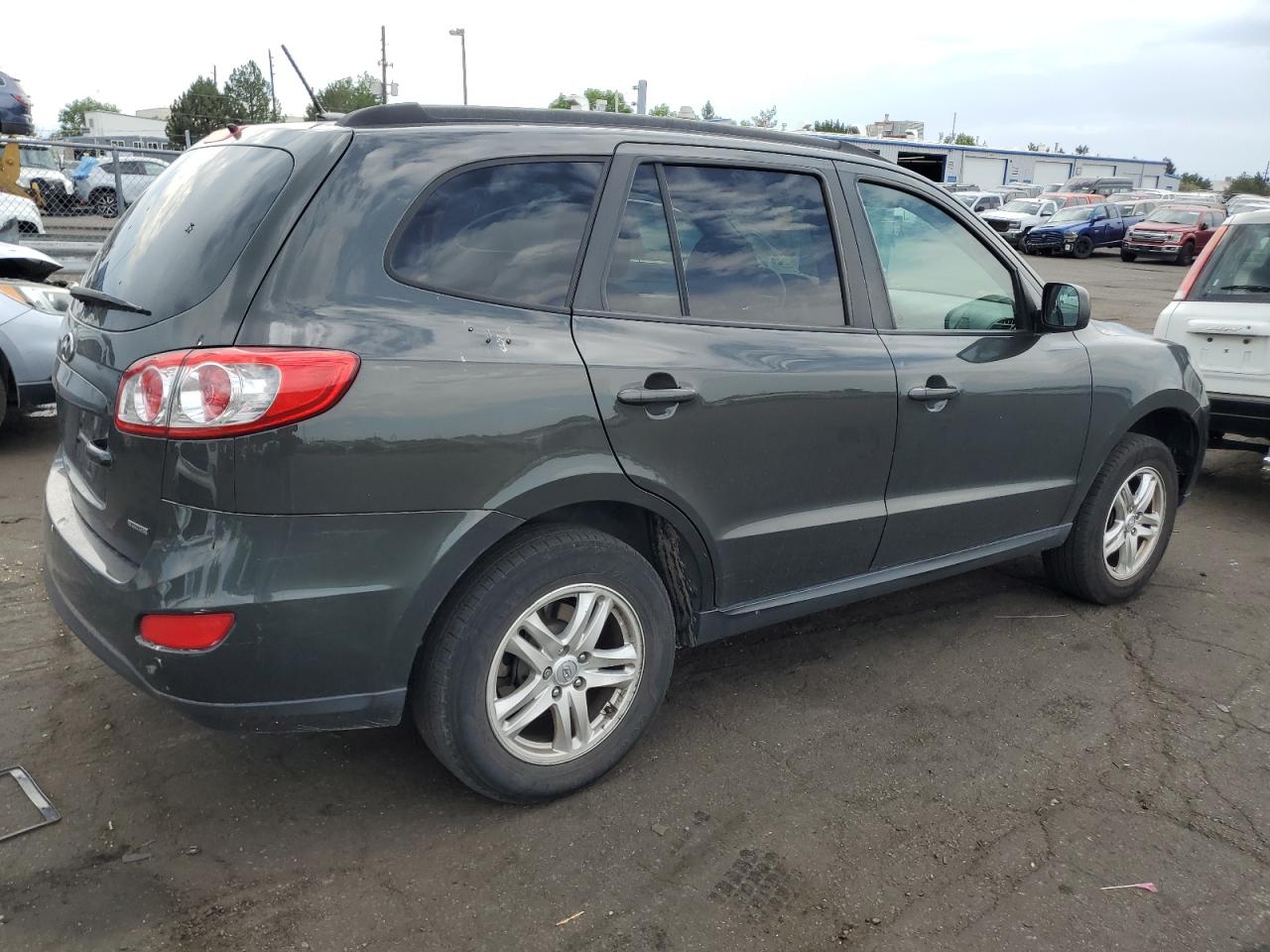 2012 Hyundai Santa Fe VIN 5XYZGDAB9CG107959 Copart auction photo, hail damage thumbnail 3