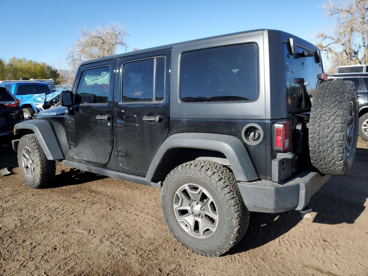 2015 Jeep Wrangler VIN 1C4BJWFG9FL763512 Copart auction photo, front end / side damage thumbnail 2