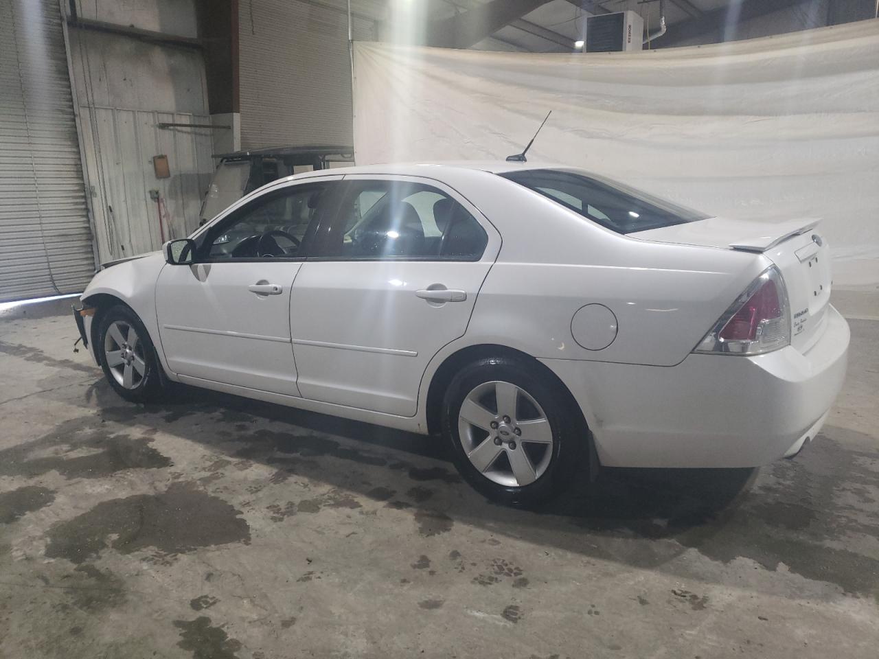 2009 Ford Fusion VIN 3FAHP07189R164290 Copart auction photo, side damage thumbnail 2