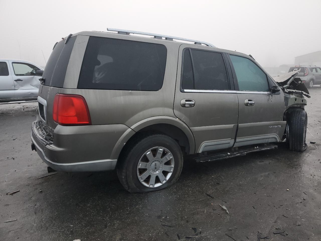 2003 Lincoln Navigator VIN 5LMFU28R83LJ29404 Copart auction photo, all over damage thumbnail 3