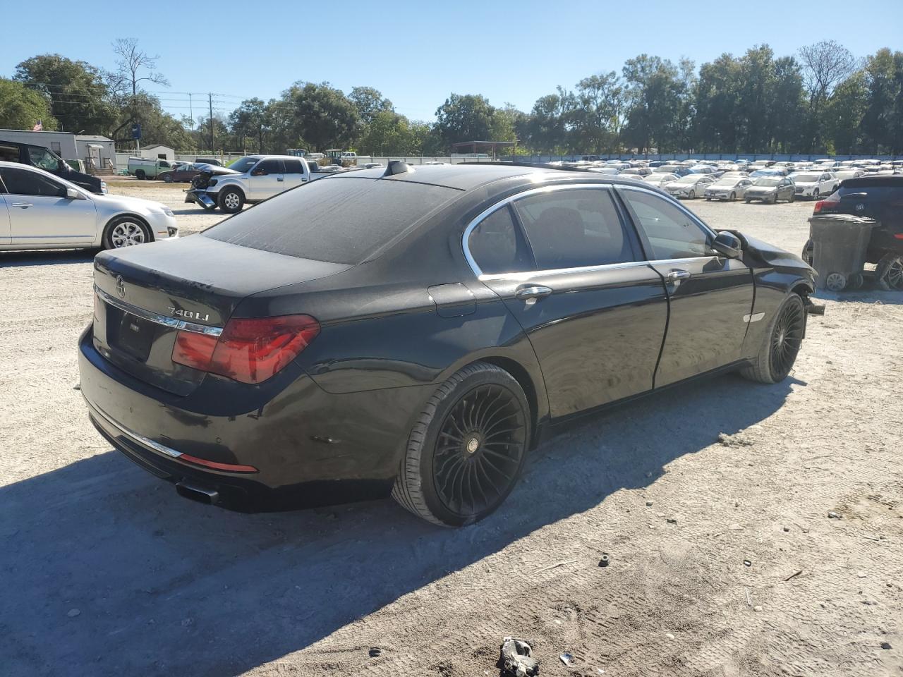 2015 BMW 7er VIN WBAYF4C50FD874041 Copart auction photo, front end damage thumbnail 3