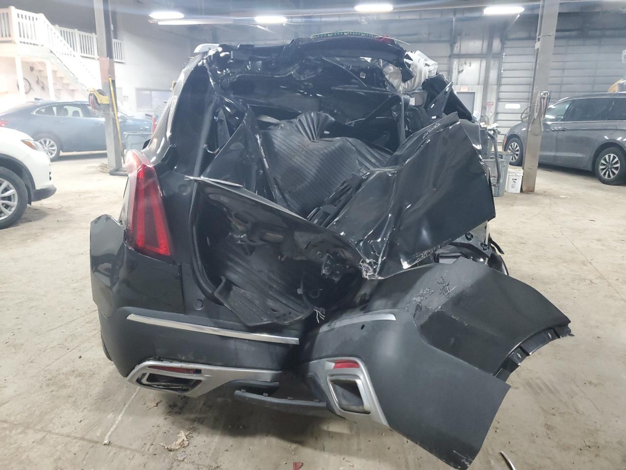 2021 Cadillac XT5 VIN 1GYKNDRS3MZ196050 Copart auction photo, rollover damage thumbnail 6