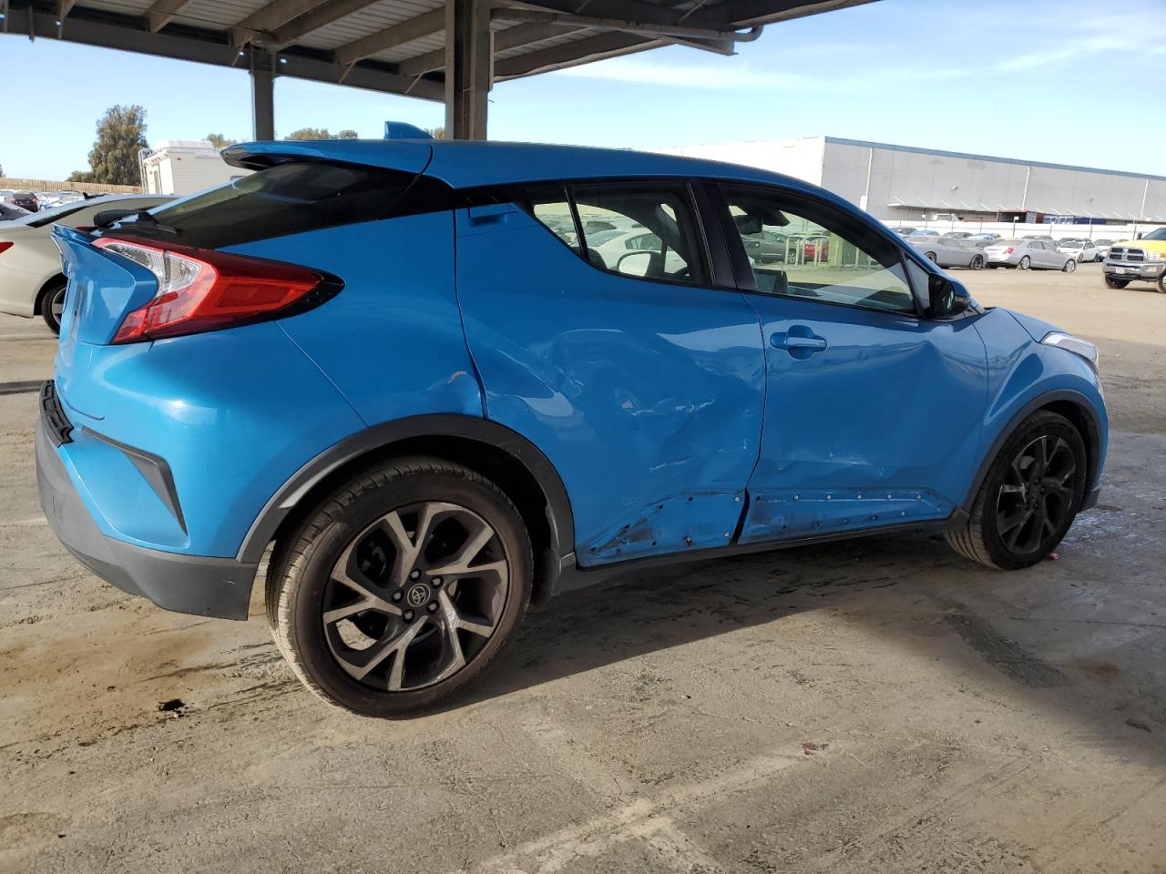 2019 Toyota C-HR VIN JTNKHMBXXK1046690 Copart auction photo, side damage thumbnail 3