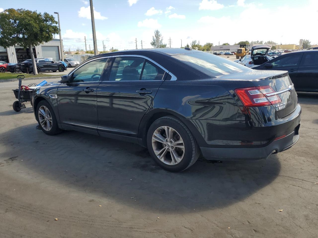 2016 Ford Taurus VIN 1FAHP2E80GG155924 Copart auction photo, front end / partial repair damage thumbnail 2