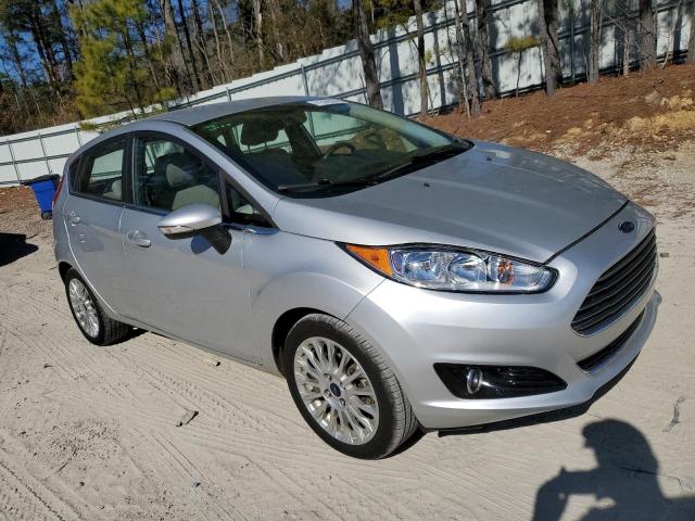 2015 Ford Fiesta VIN 3FADP4FJ1FM148125 Copart auction photo, minor dent/scratches damage thumbnail 4
