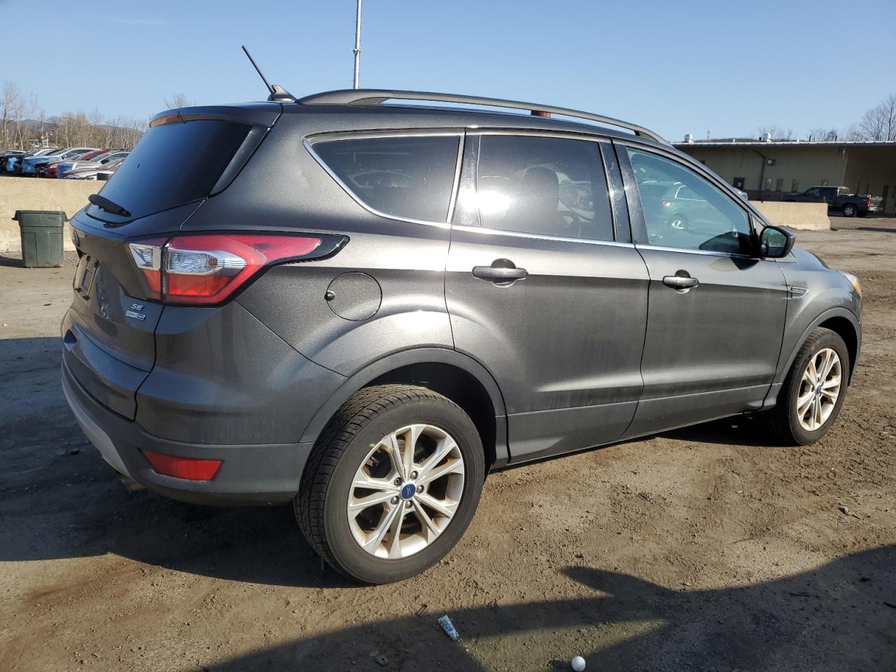 2018 Ford Escape VIN 1FMCU9GD5JUB01703 Copart auction photo, side / rear end damage thumbnail 3