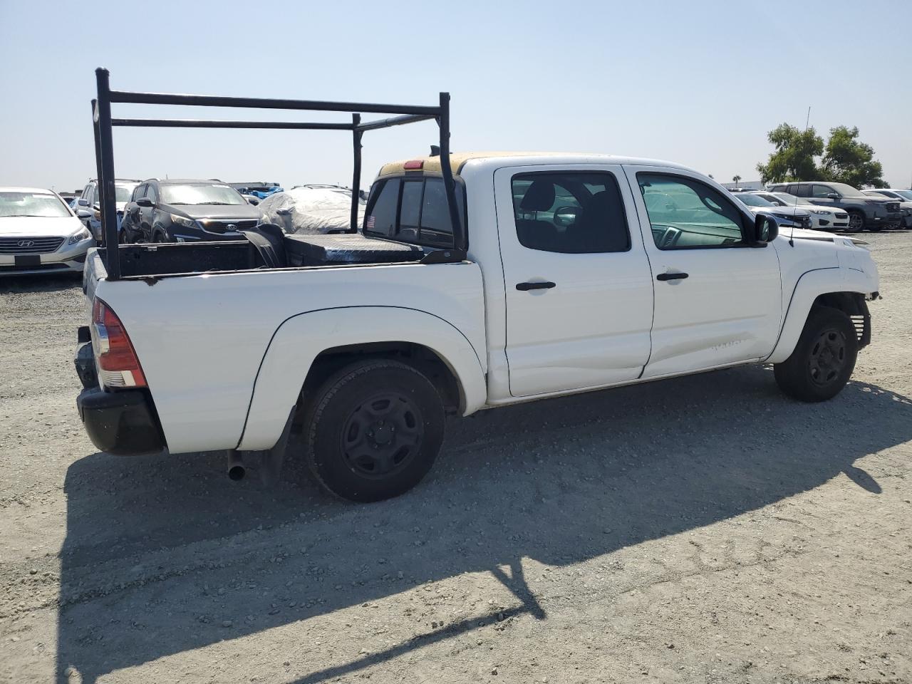 2015 Toyota Tacoma VIN 5TFJX4CN9FX052399 Copart auction photo, front end / side damage thumbnail 3