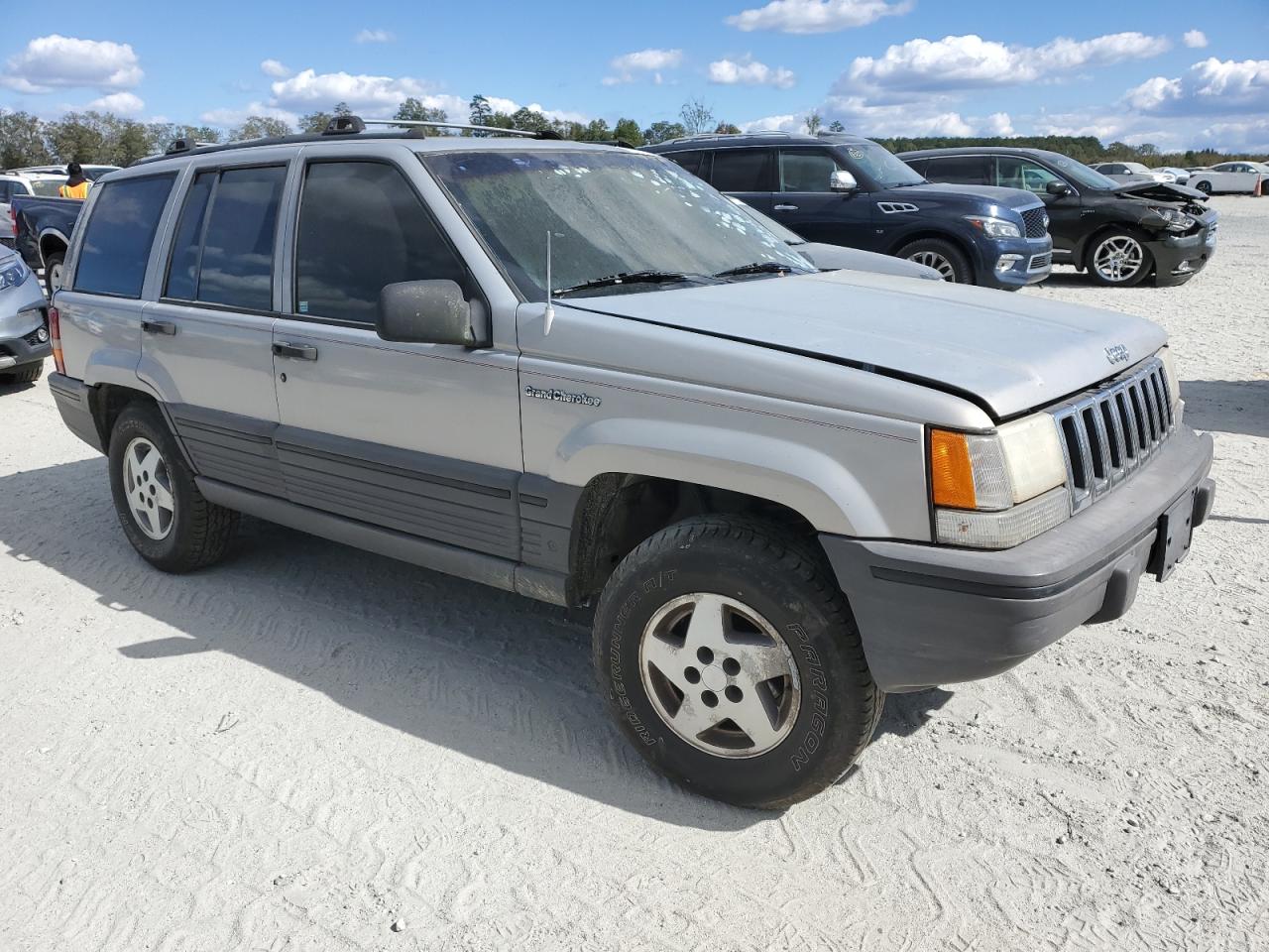 1994 Jeep Grand Cherokee VIN 1J4GZ58S0RC357210 Copart auction photo, burn damage thumbnail 4