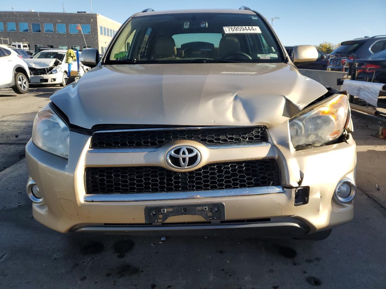 2010 Toyota RAV 4 VIN JTMDF4DV2AD024307 Copart auction photo, front end damage thumbnail 5