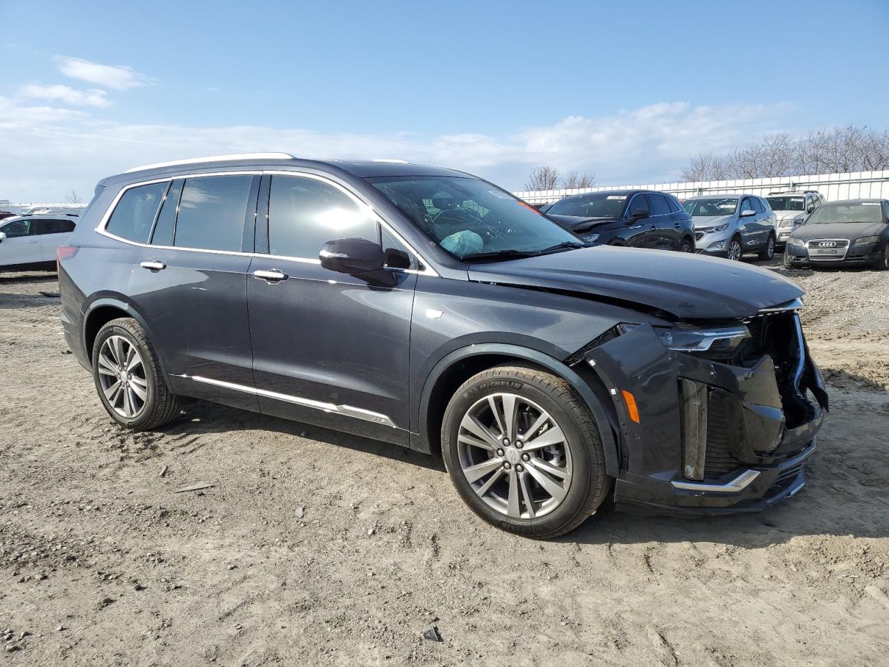 2021 Cadillac XT6 VIN 1GYKPCRS6MZ205831 Copart auction photo, front end / side damage thumbnail 4