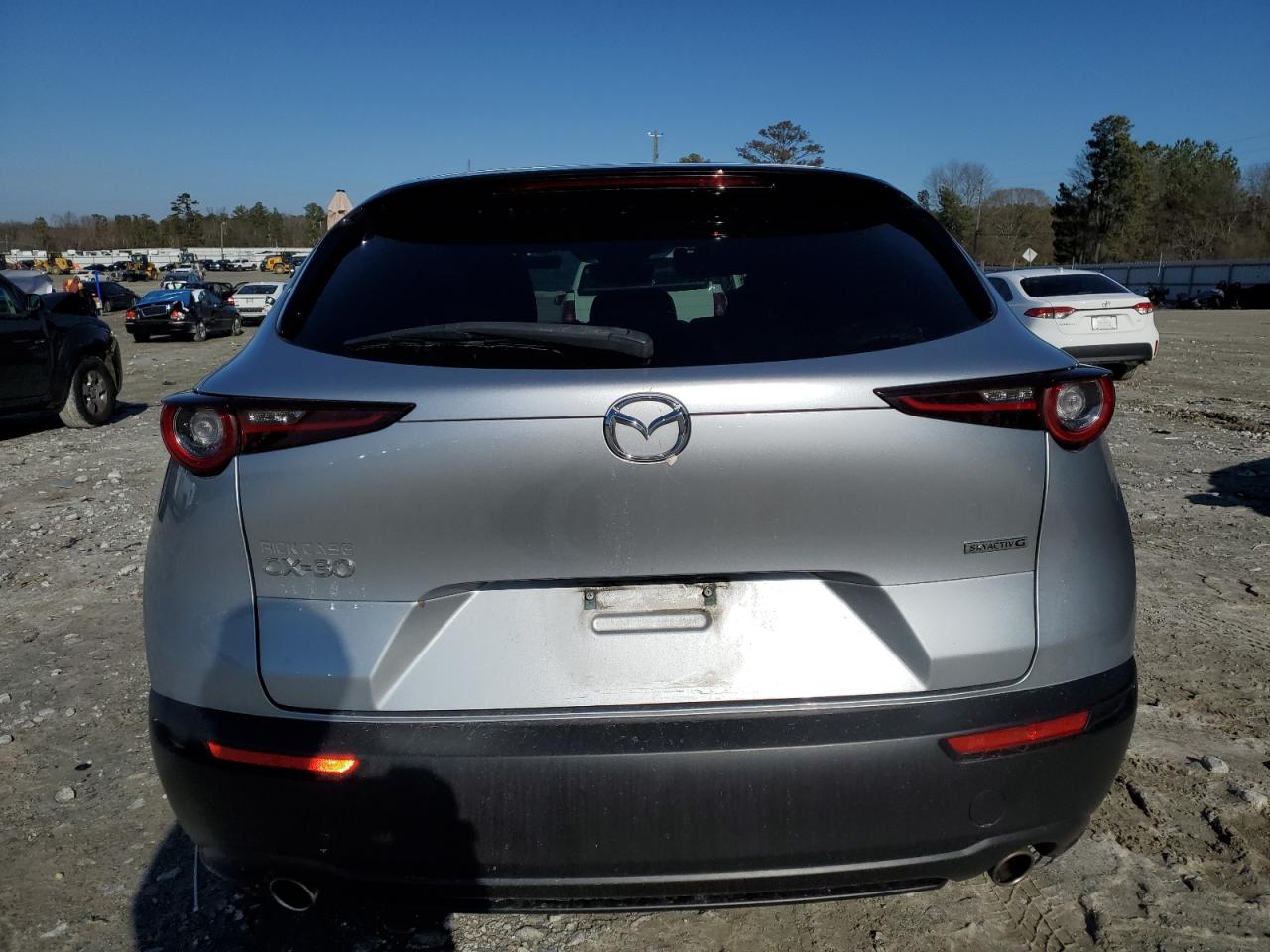 2021 Mazda CX-30 VIN 3MVDMABL5MM237202 Copart auction photo, side / front end damage thumbnail 6