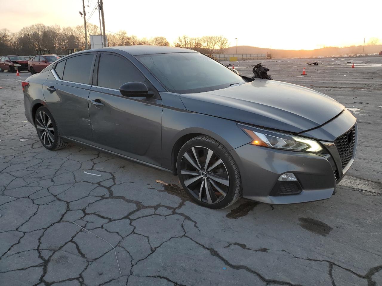 2019 Nissan Altima VIN 1N4BL4CVXKC202110 Copart auction photo, side / front end damage thumbnail 4