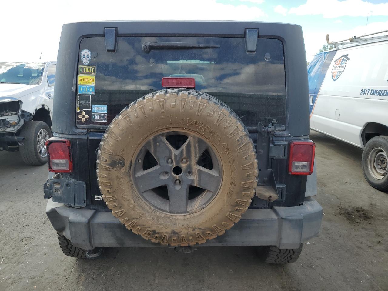 2011 Jeep Wrangler VIN 1J4BA3H19BL523176 Copart auction photo, rear end damage thumbnail 6