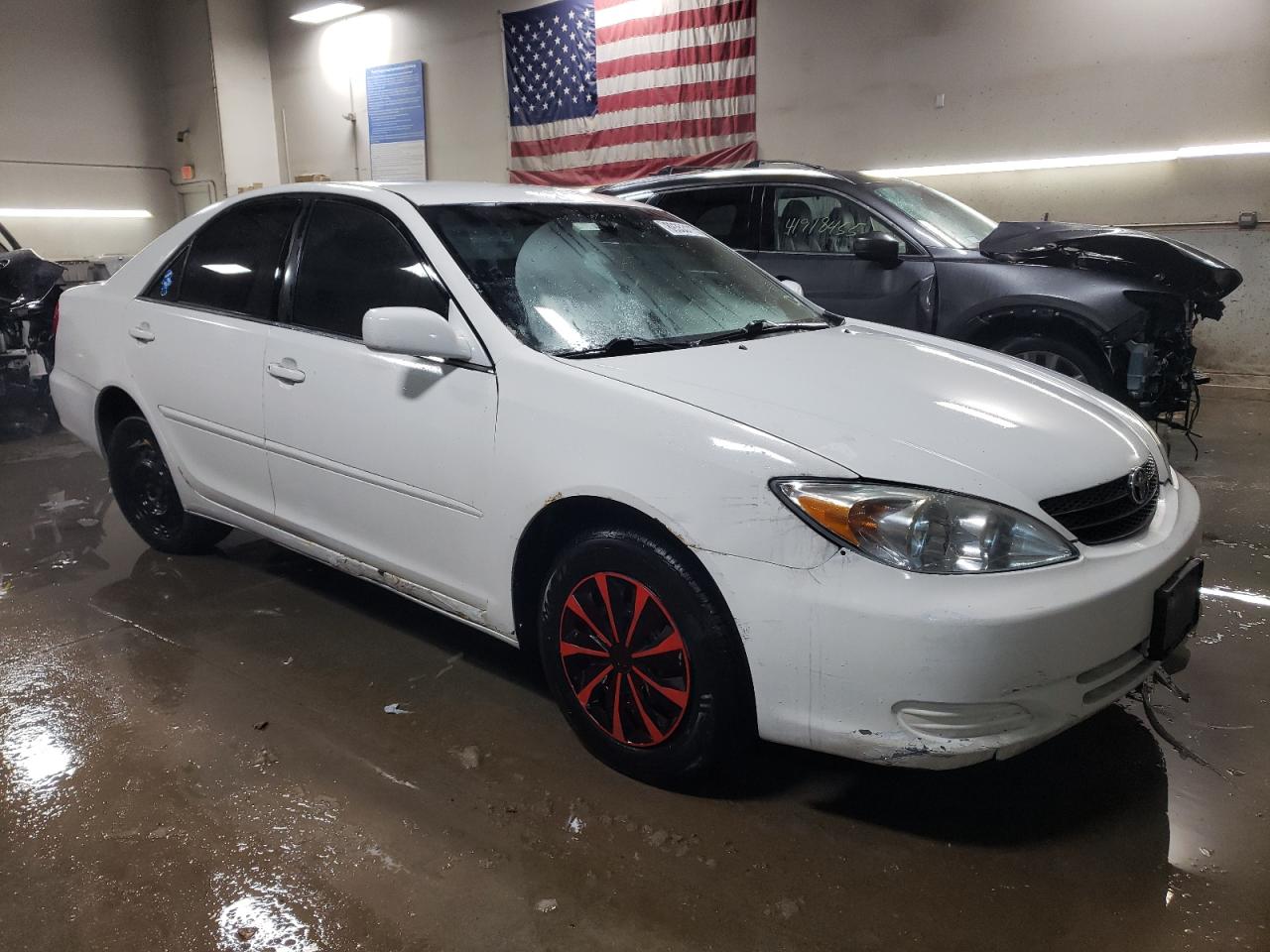 2003 Toyota Camry VIN 4T1BE32KX3U208745 Copart auction photo, rear end damage thumbnail 4