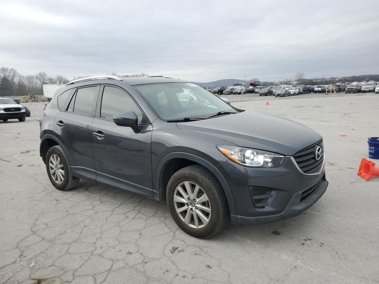 2016 Mazda CX-5 VIN JM3KE2BE9G0622516 Copart auction photo, rear end damage thumbnail 4