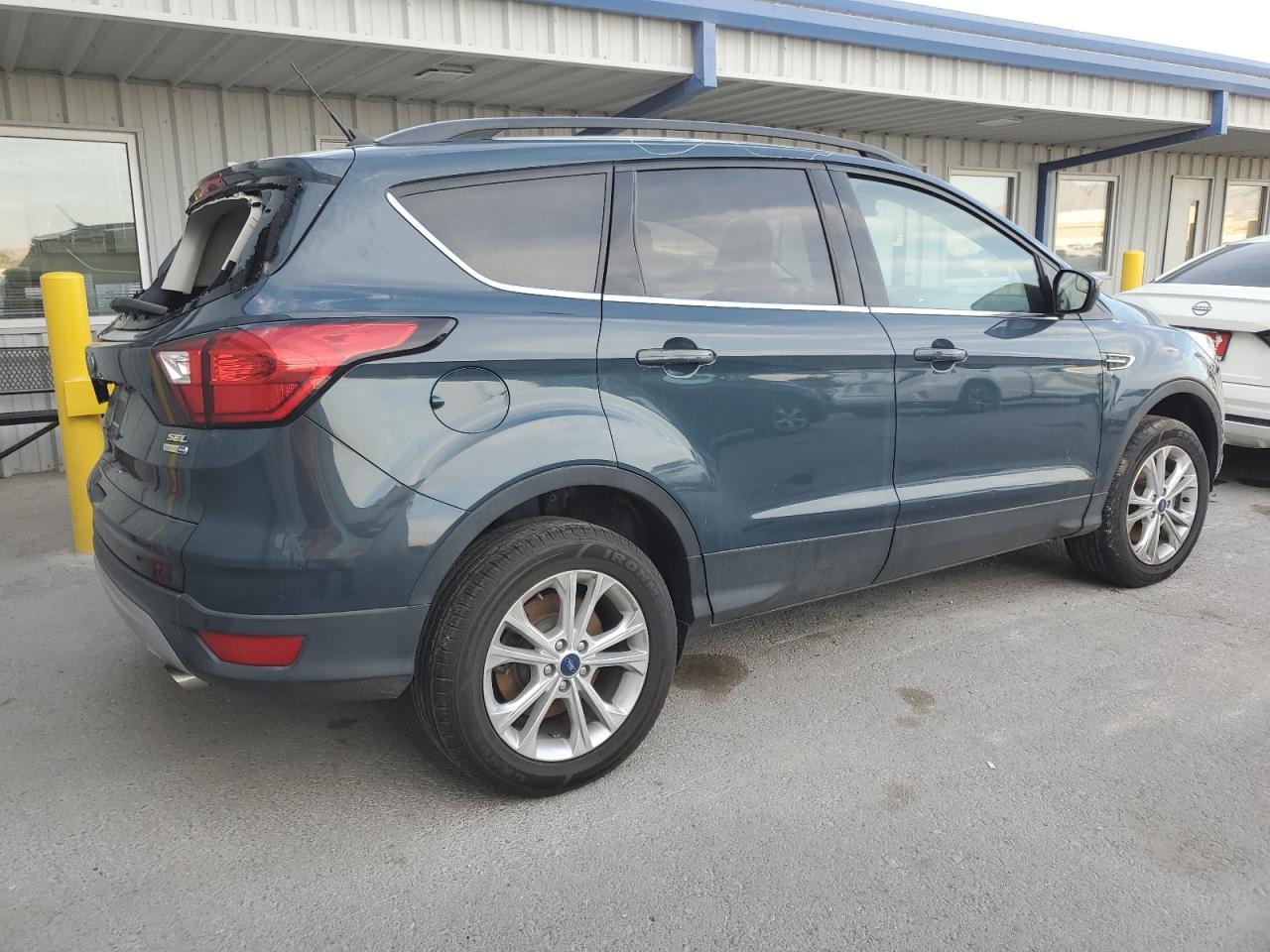 2019 Ford Escape VIN 1FMCU9HD0KUA31463 Copart auction photo, all over damage thumbnail 3