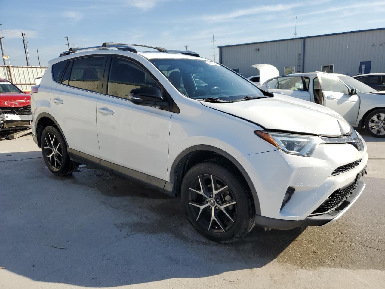2016 Toyota RAV 4 VIN JTMNFREV2GJ078703 Copart auction photo, front end / minor dent/scratches damage thumbnail 4
