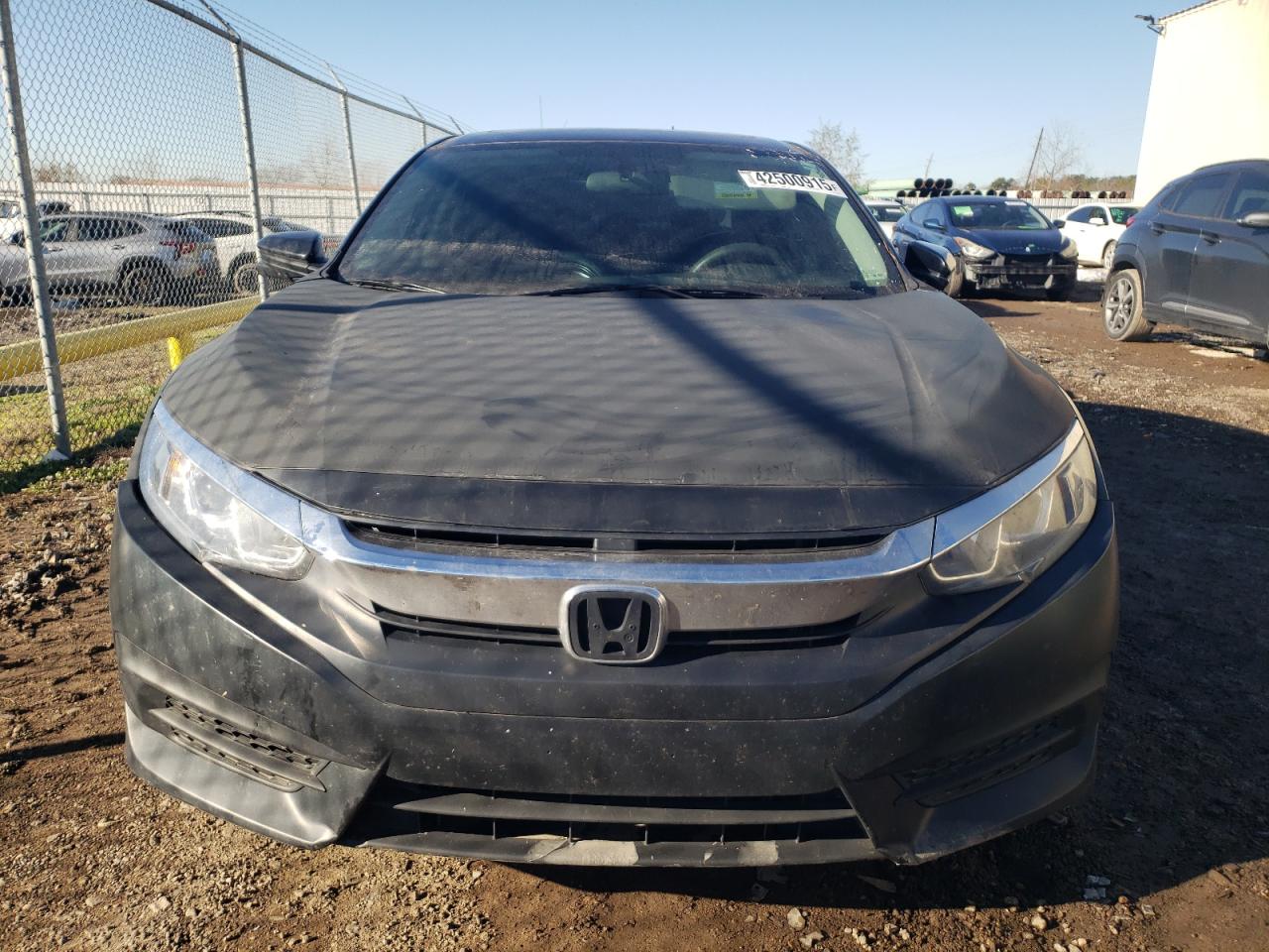 2017 Honda Civic VIN 19XFC2F74HE047326 Copart auction photo, rear end / minor dent/scratches damage thumbnail 5