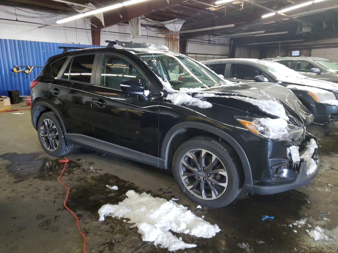 2016 Mazda CX-5 VIN JM3KE4DY5G0844294 Copart auction photo, front end damage thumbnail 4