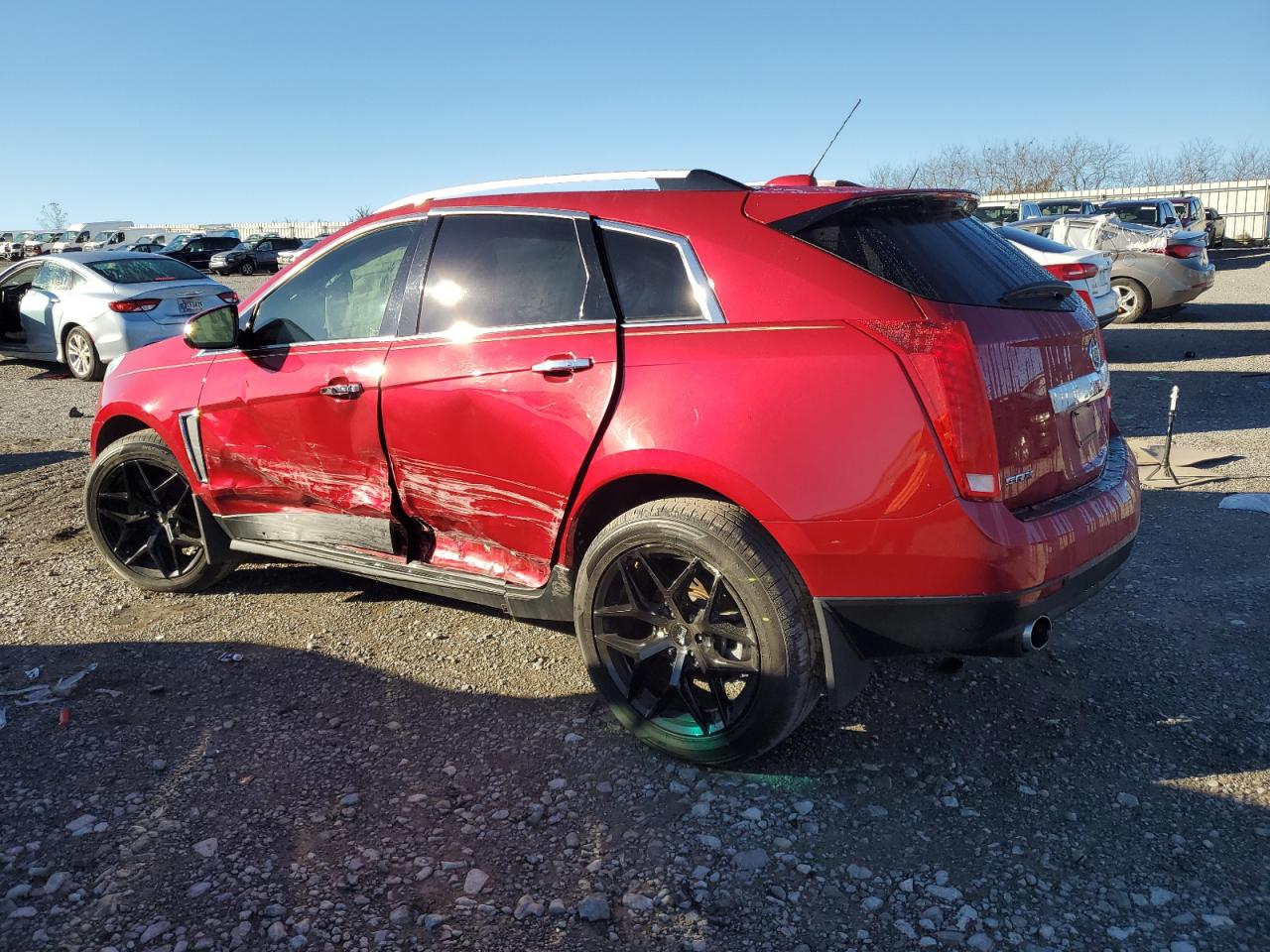 2015 Cadillac SRX VIN 3GYFNDE3XFS585297 Copart auction photo, side damage thumbnail 2