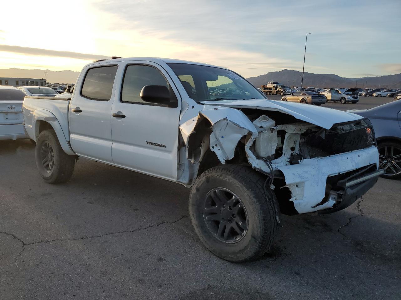 2012 Toyota Tacoma VIN 3TMLU4EN6CM092584 Copart auction photo, front end damage thumbnail 4