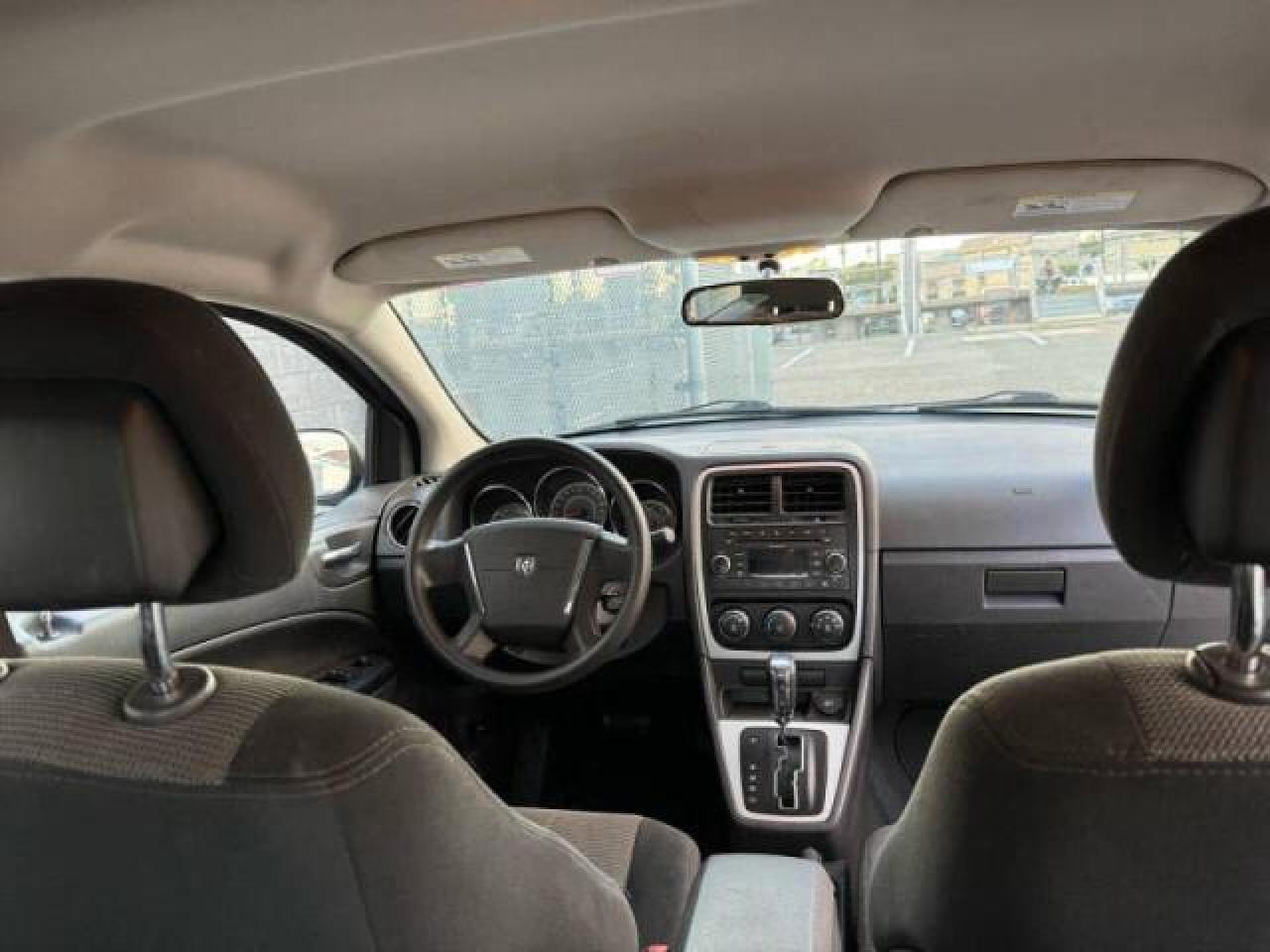 2010 Dodge Caliber VIN 1B3CB4HA1AD579409 Copart auction photo, normal wear damage thumbnail 9