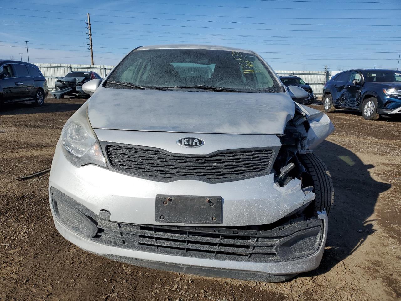 2015 KIA Rio VIN KNADM4A30F6456895 Copart auction photo, front end / minor dent/scratches damage thumbnail 5