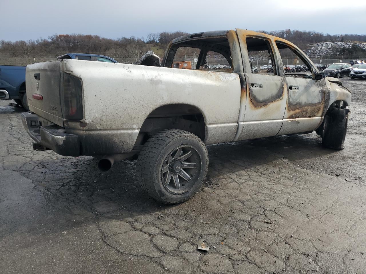 2005 Dodge RAM VIN 3D7KS28CX5G725157 Copart auction photo, burn damage thumbnail 3