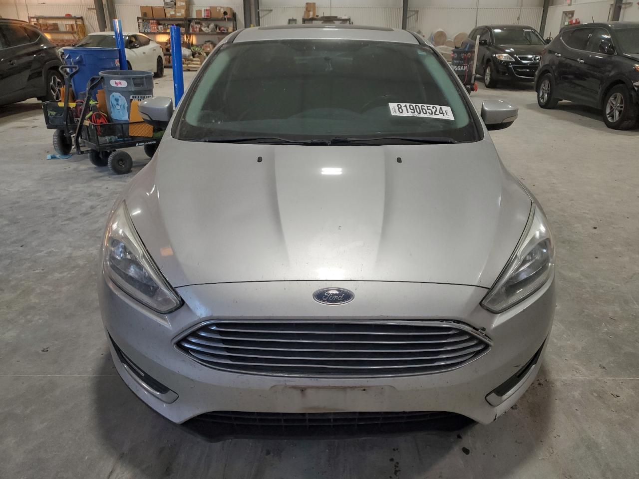 2016 Ford Focus VIN 1FADP3J26GL267690 Copart auction photo, rear end damage thumbnail 5