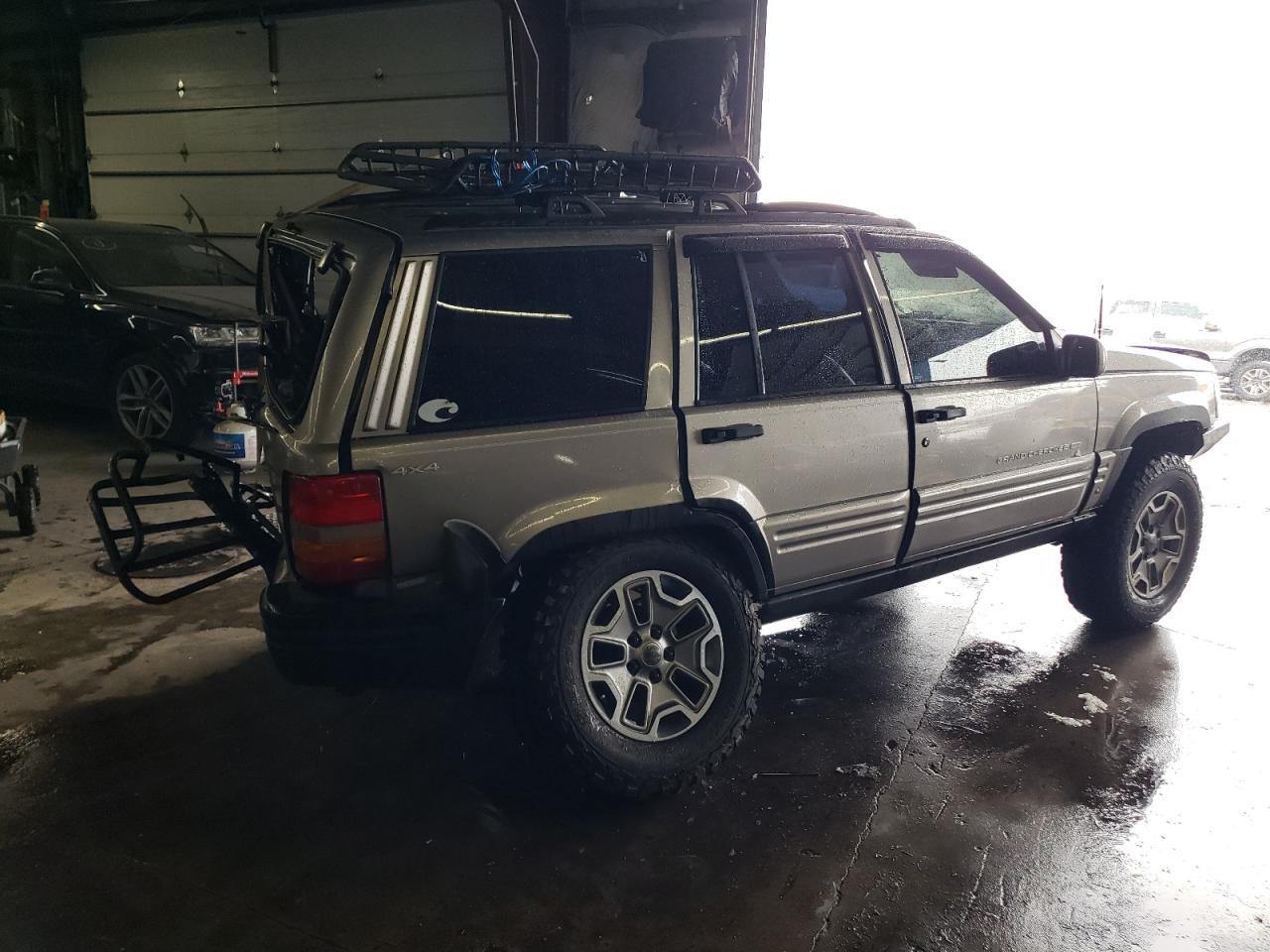 1998 Jeep Grand Cherokee VIN 1J4GZ78S9WC308708 Copart auction photo, all over damage thumbnail 3