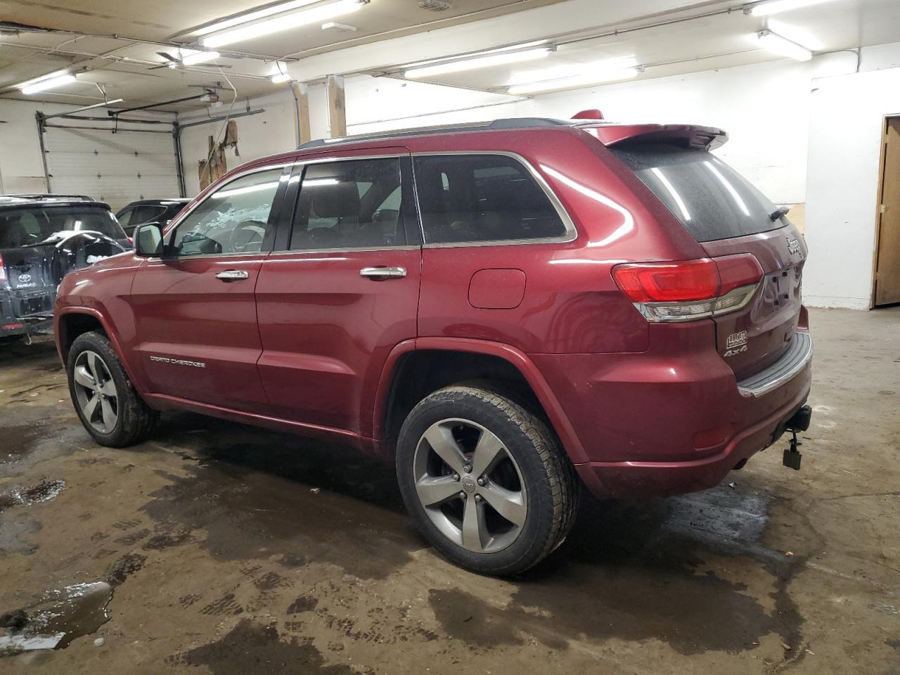 2015 Jeep Grand Cherokee VIN 1C4RJFCG7FC679837 Copart auction photo, rear end damage thumbnail 2