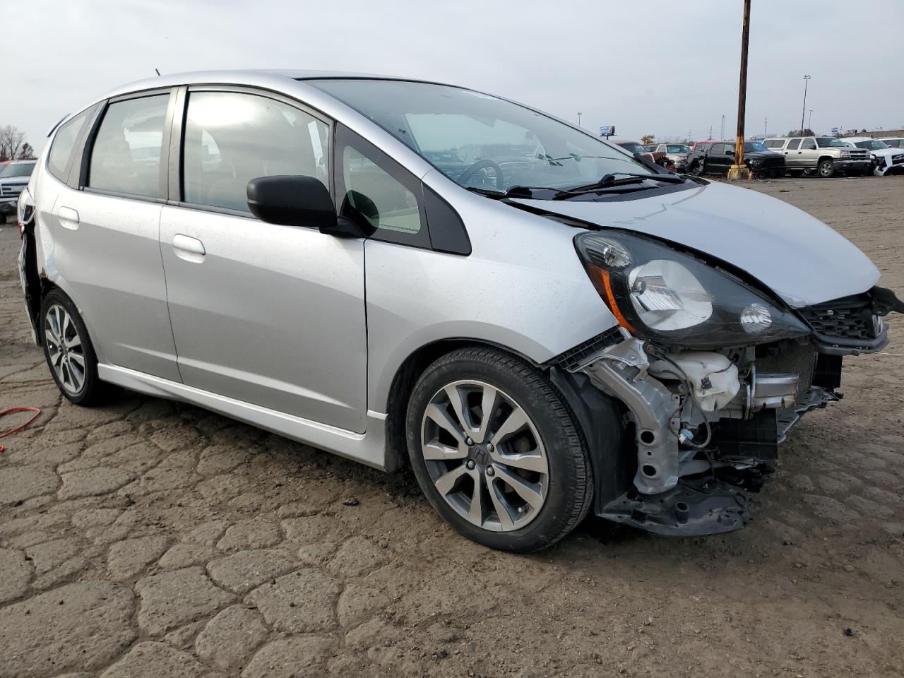 2012 Honda Fit VIN JHMGE8H57CS003385 Copart auction photo, all over damage thumbnail 4