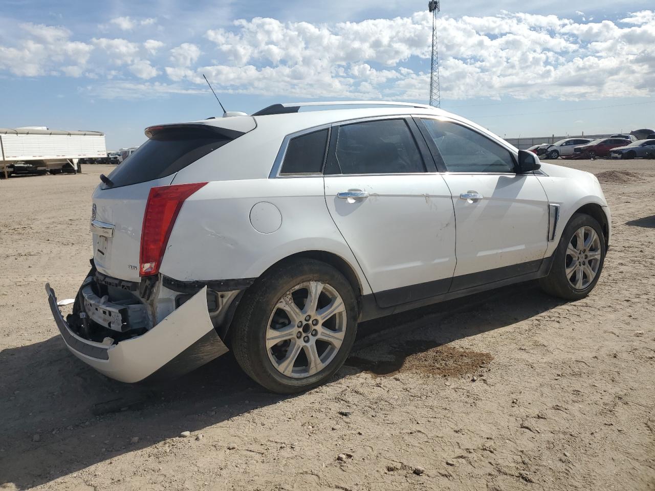 2015 Cadillac SRX VIN 3GYFNGE32FS587417 Copart auction photo, rear end / minor dent/scratches damage thumbnail 3