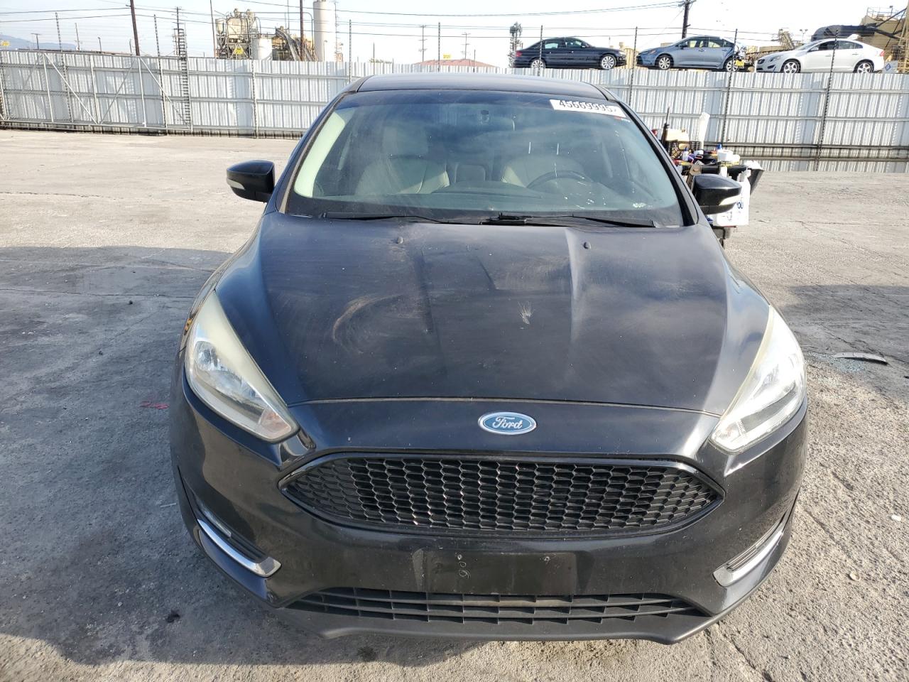 2016 Ford Focus VIN 1FADP3N27GL259995 Copart auction photo, rear end damage thumbnail 5