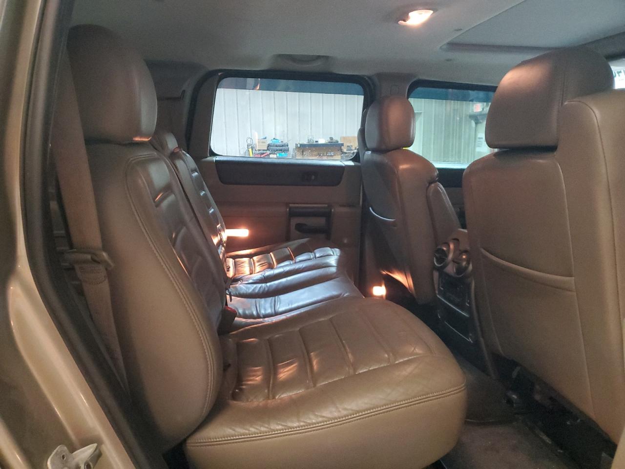 2004 Hummer H2 VIN 5GRGN23U94H110447 Copart auction photo, front end damage thumbnail 11