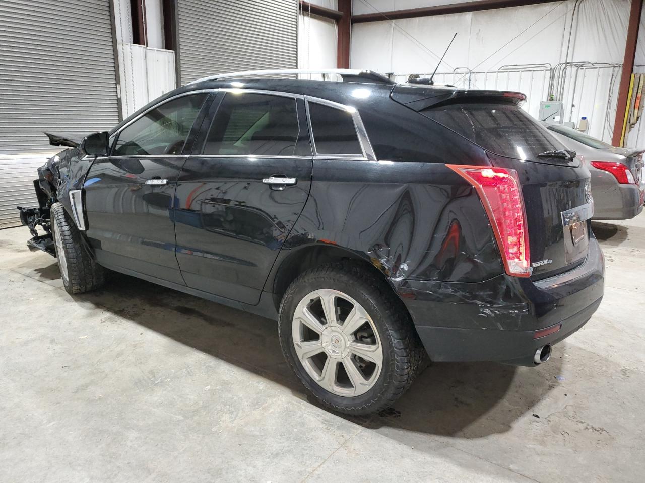 2015 Cadillac SRX VIN 3GYFNGE35FS617204 Copart auction photo, all over / mechanical damage thumbnail 2