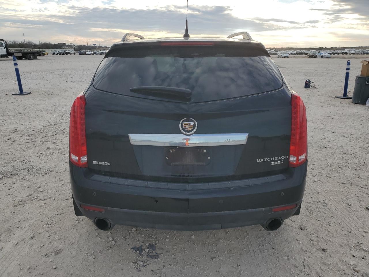 2012 Cadillac SRX VIN 3GYFNAE34CS627120 Copart auction photo, front end damage thumbnail 6