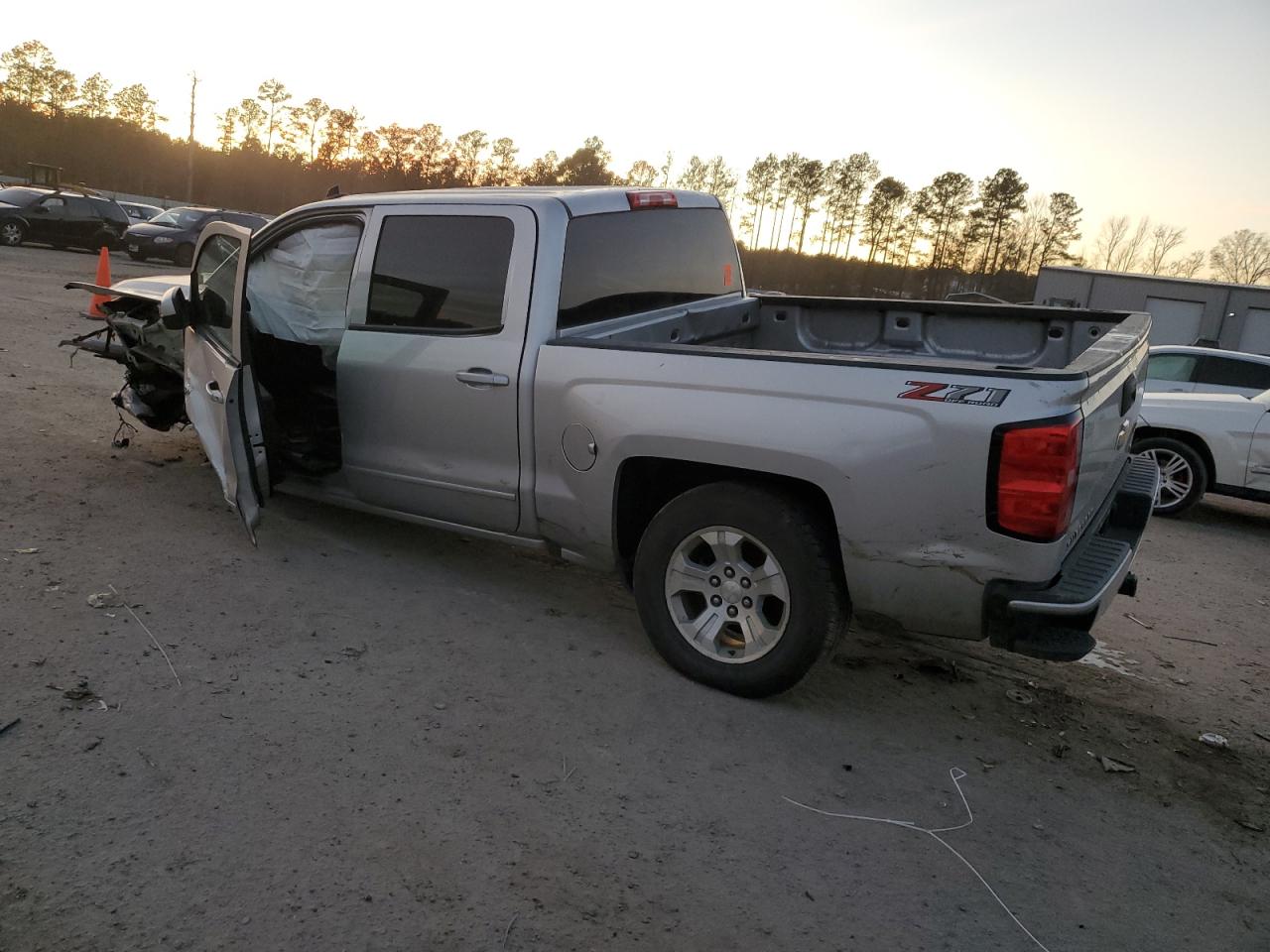 2018 Chevrolet Silverado VIN 3GCUKREC2JG610420 Copart auction photo, front end / side damage thumbnail 2