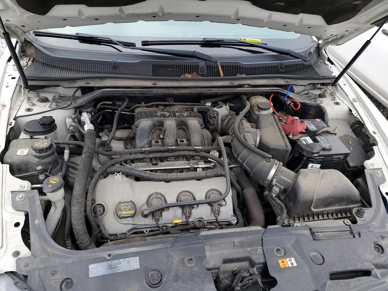 2010 Ford Taurus VIN 1FAHP2FW6AG160632 Copart auction photo, side damage thumbnail 11
