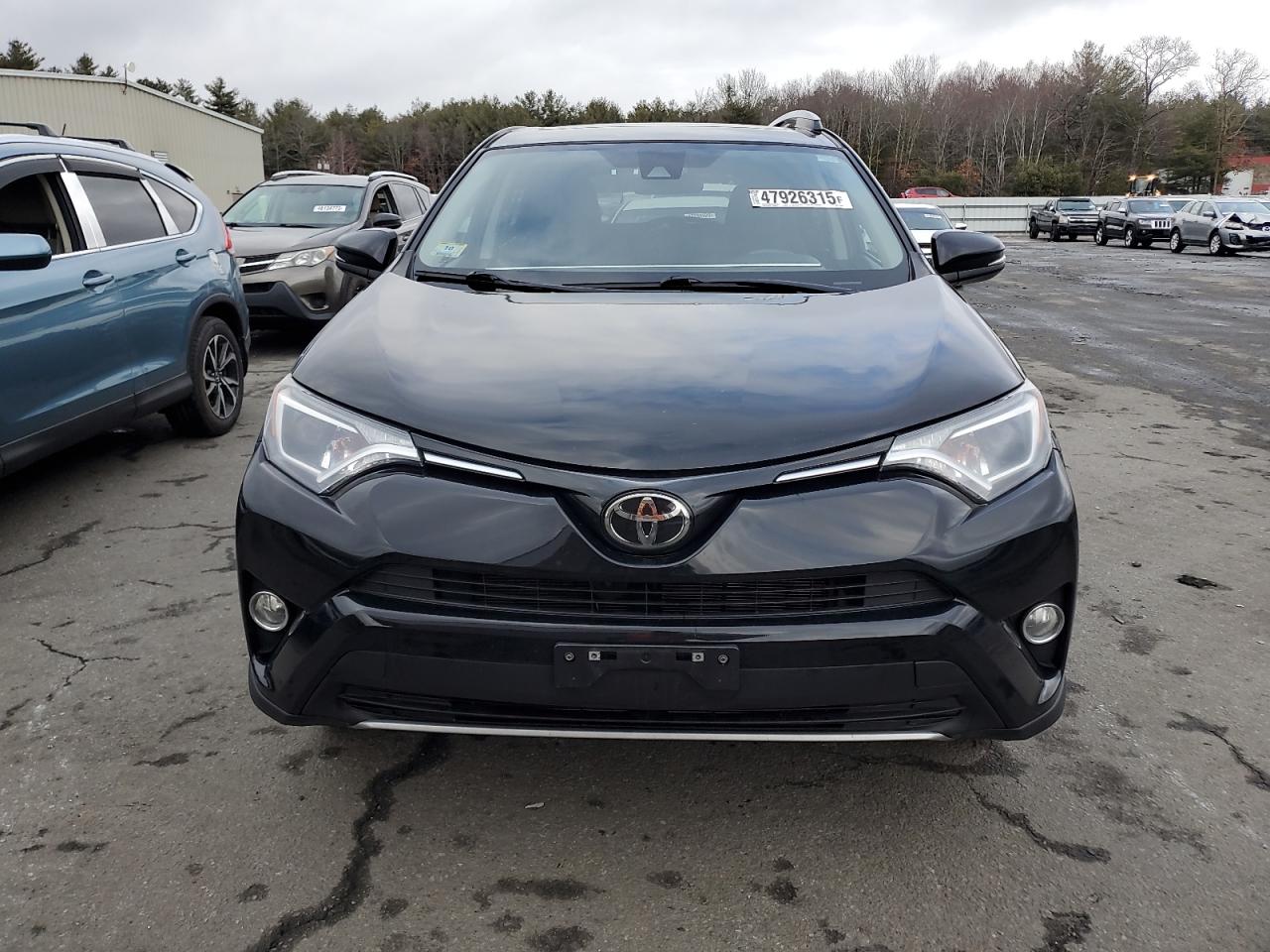 2018 Toyota RAV 4 VIN 2T3RFREV7JW852647 Copart auction photo, rear end / side damage thumbnail 5
