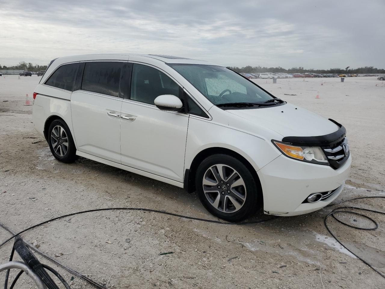 2014 Honda Odyssey VIN 5FNRL5H93EB052567 Copart auction photo, rear end / minor dent/scratches damage thumbnail 4