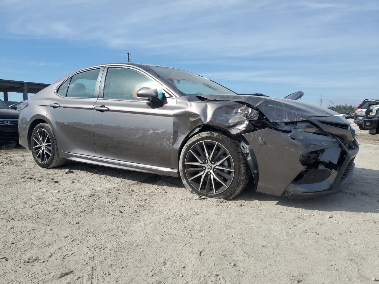 2022 Toyota Camry VIN 4T1G11AK0NU656910 Copart auction photo, front end / minor dent/scratches damage thumbnail 4