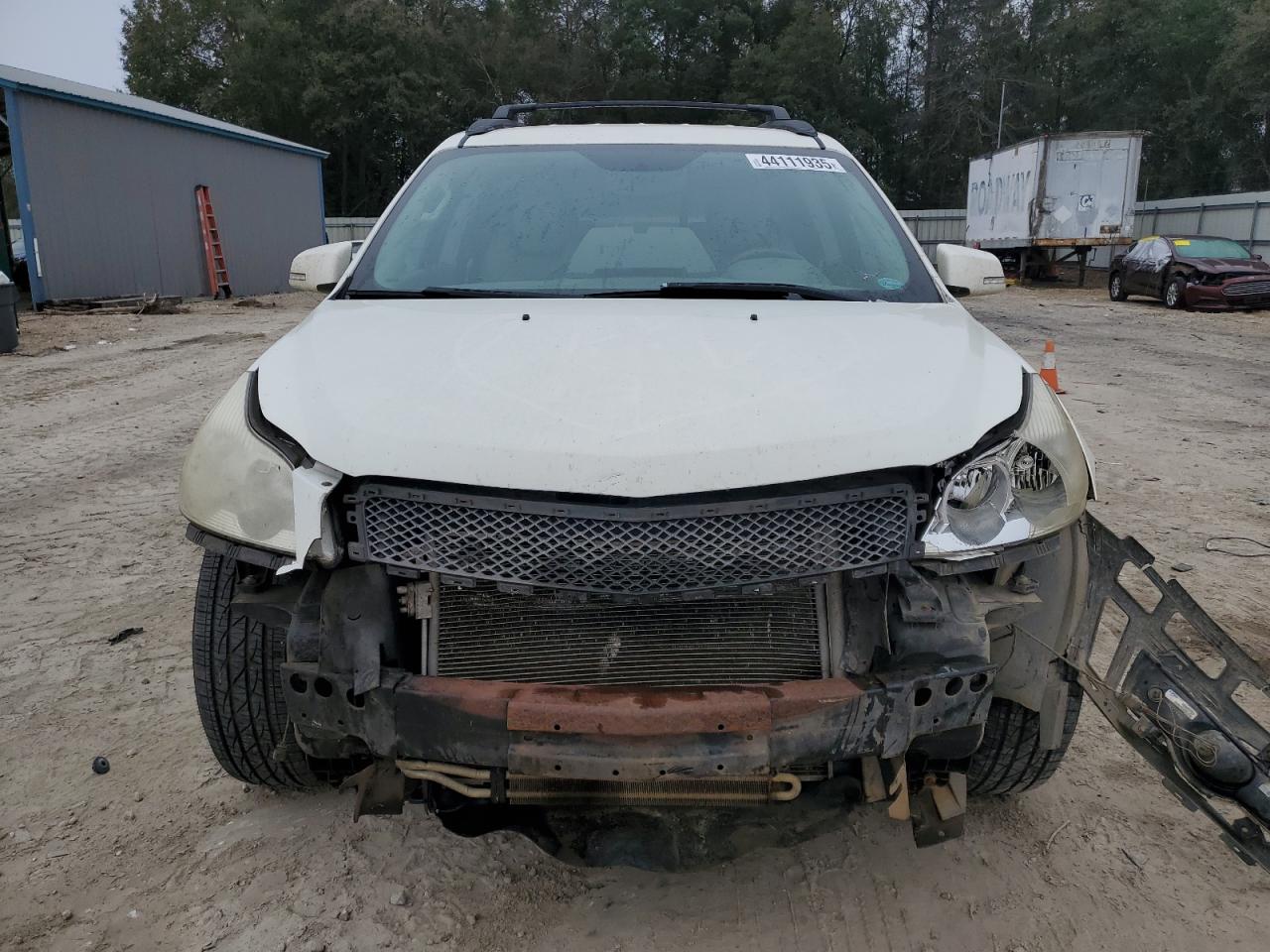 2011 Chevrolet Traverse VIN 1GNKRJED3BJ354552 Copart auction photo, front end damage thumbnail 5