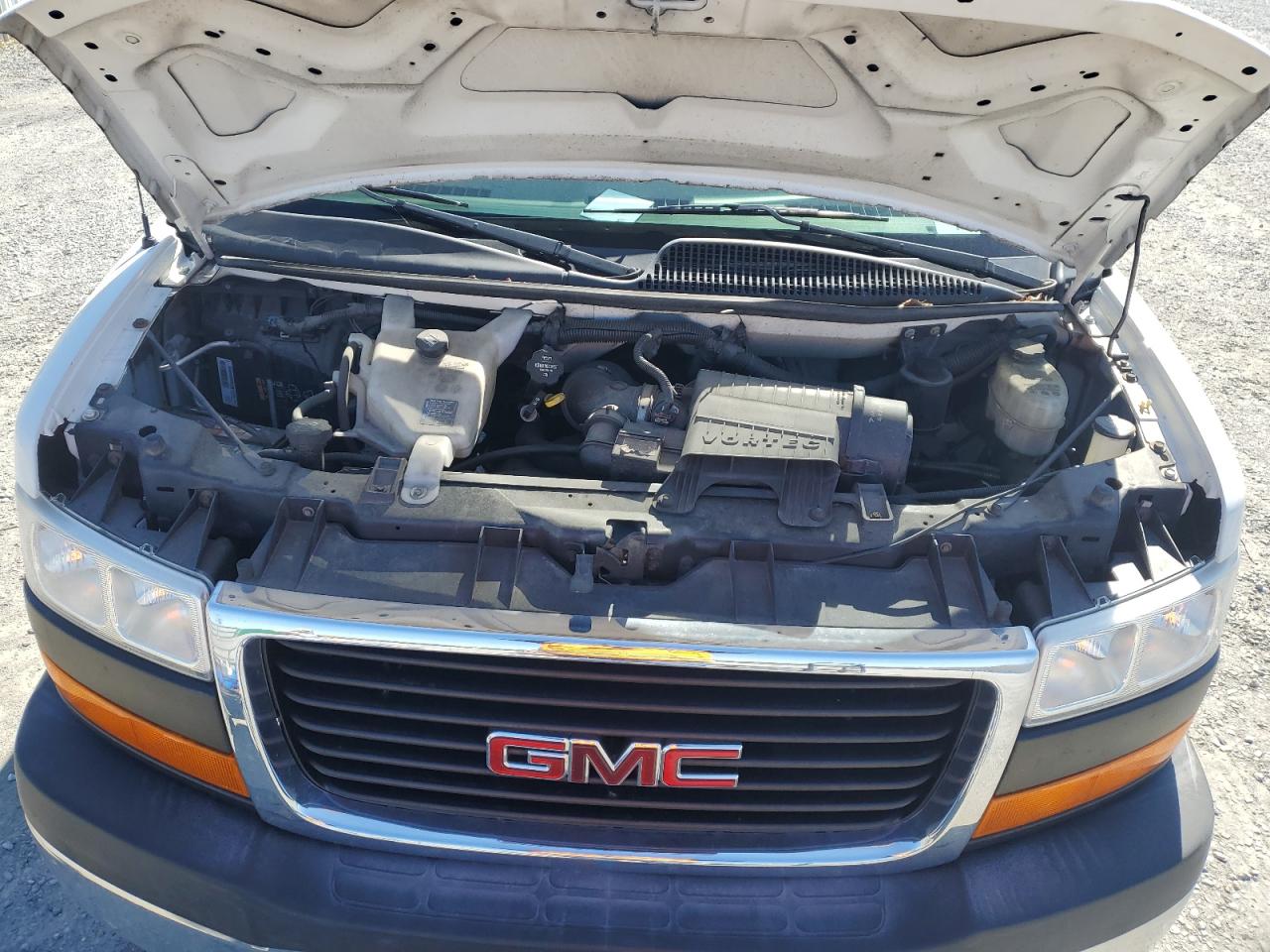 2014 GMC Savana VIN 1GTZ7TCG6E1104331 Copart auction photo, side / rear end damage thumbnail 12