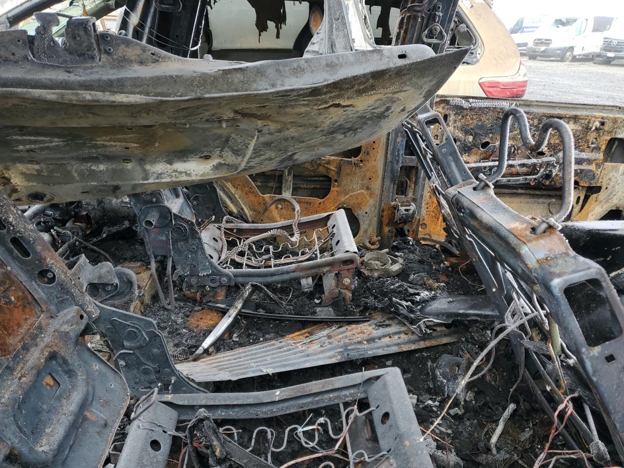 2010 Cadillac Escalade VIN 1GYUKAEF9AR183825 Copart auction photo, burn damage thumbnail 11