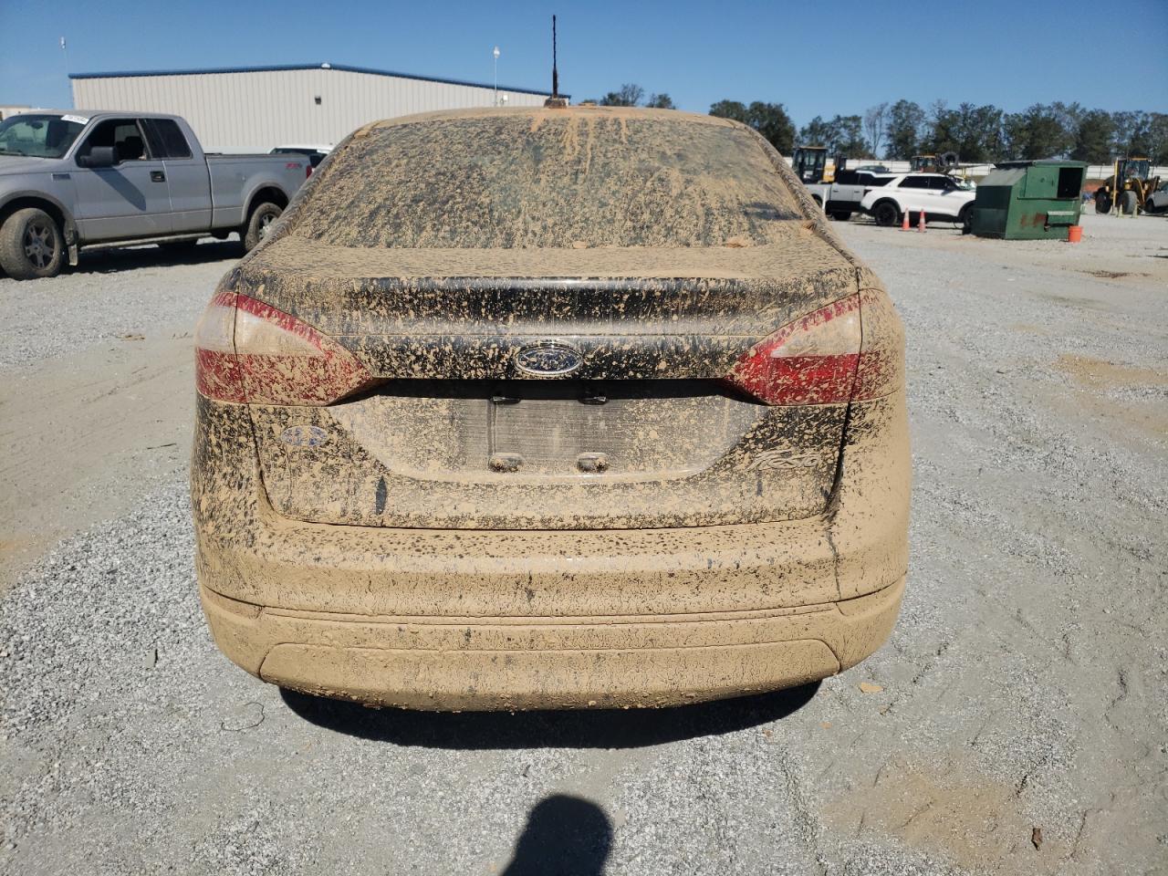2014 Ford Fiesta VIN 3FADP4AJ4EM153387 Copart auction photo, water/flood damage thumbnail 6