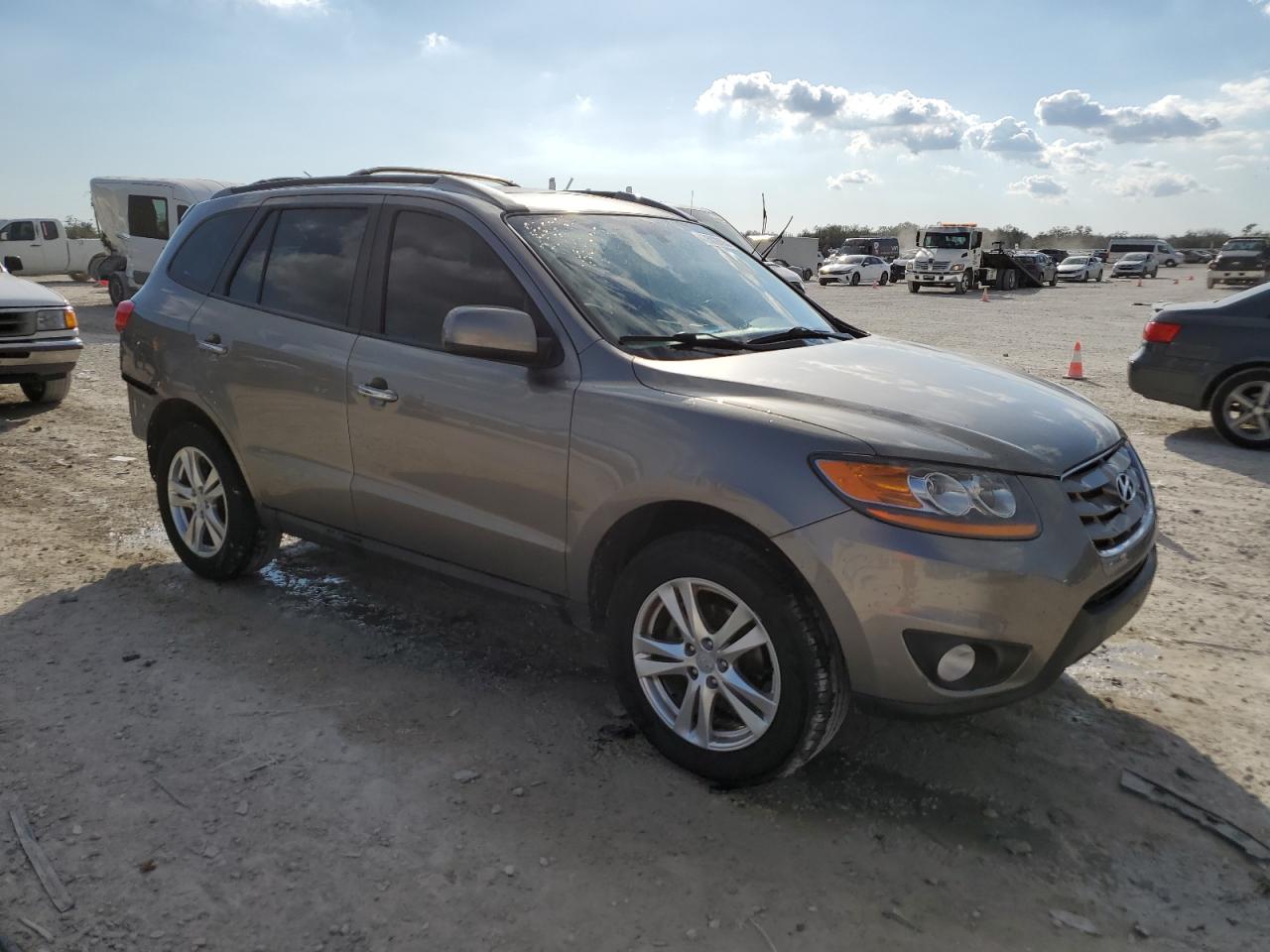 2011 Hyundai Santa Fe VIN 5XYZK3AB1BG063785 Copart auction photo, rear end damage thumbnail 4