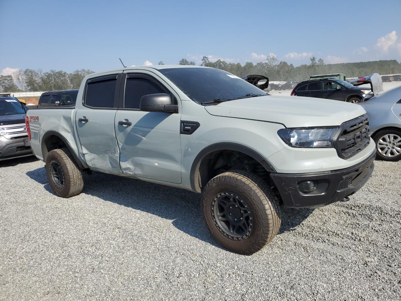 2022 Ford Ranger VIN 1FTER4FH8NLD31267 Copart auction photo, side damage thumbnail 4