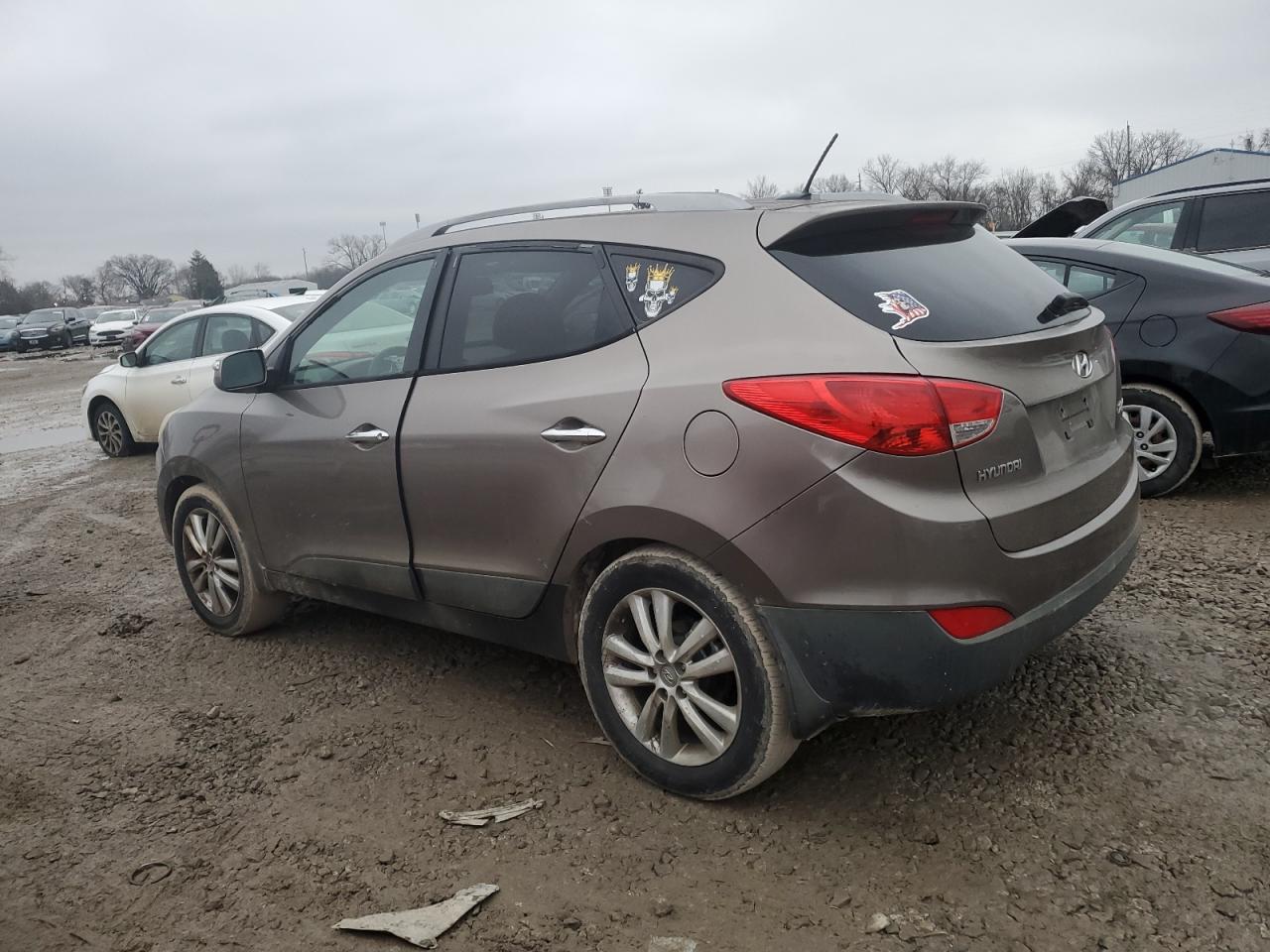 2011 Hyundai Tucson VIN KM8JU3AC6BU211942 Copart auction photo, undercarriage / minor dent/scratches damage thumbnail 2
