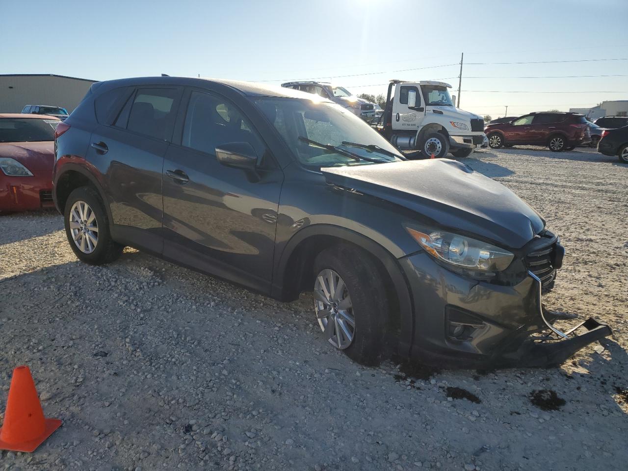 2016 Mazda CX-5 VIN JM3KE2CY7G0638805 Copart auction photo, all over damage thumbnail 4